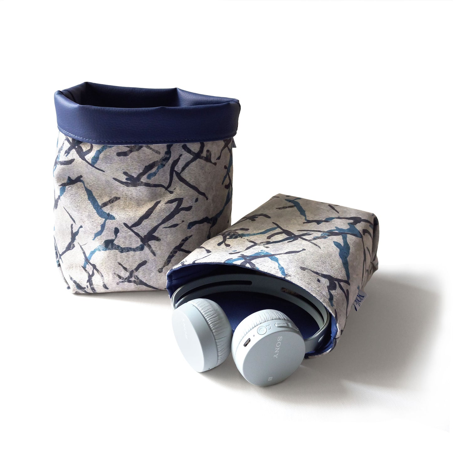 Two printed storage baskets