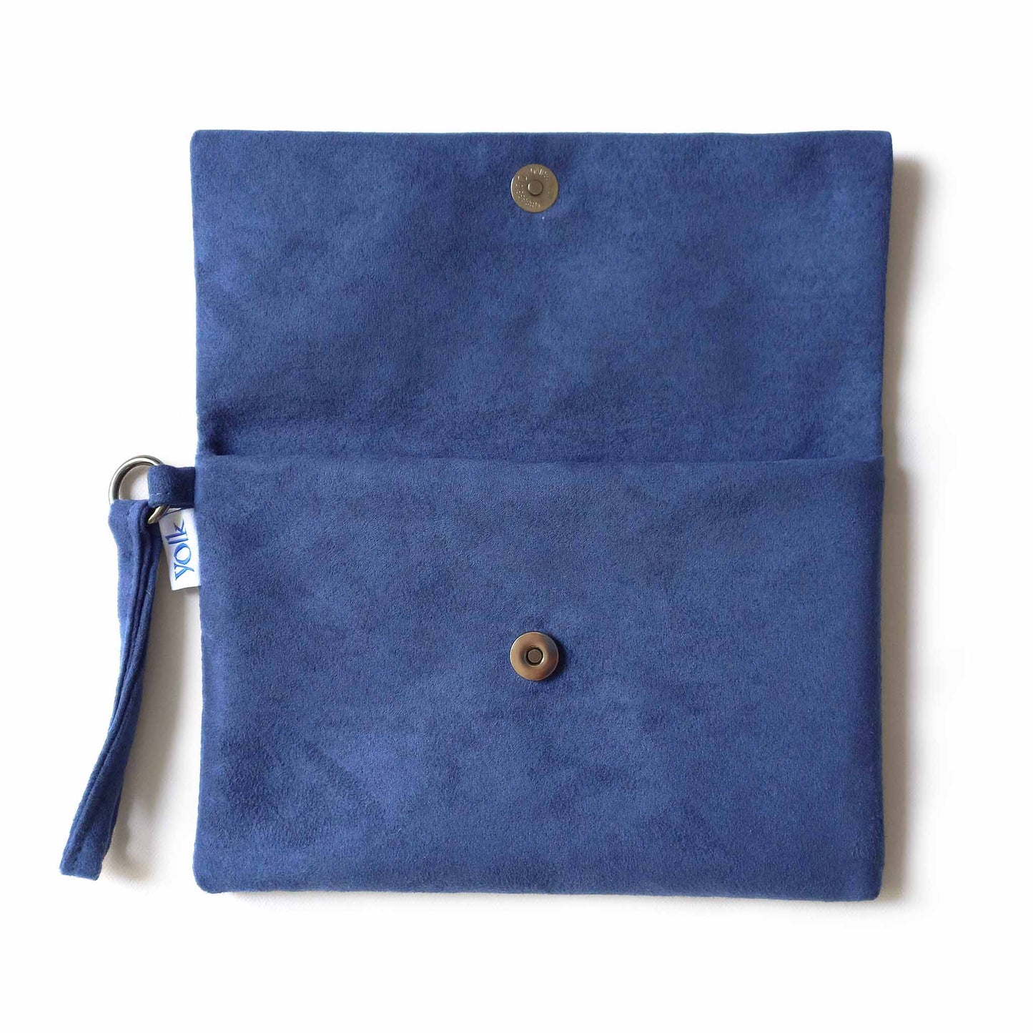 Open handmade clutch bag, button closure detail