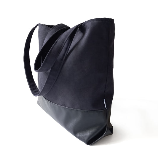 Black shoulder bag side view