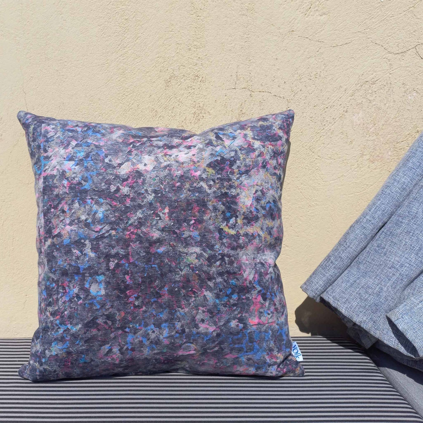 Printed decorative cushion on a balcony