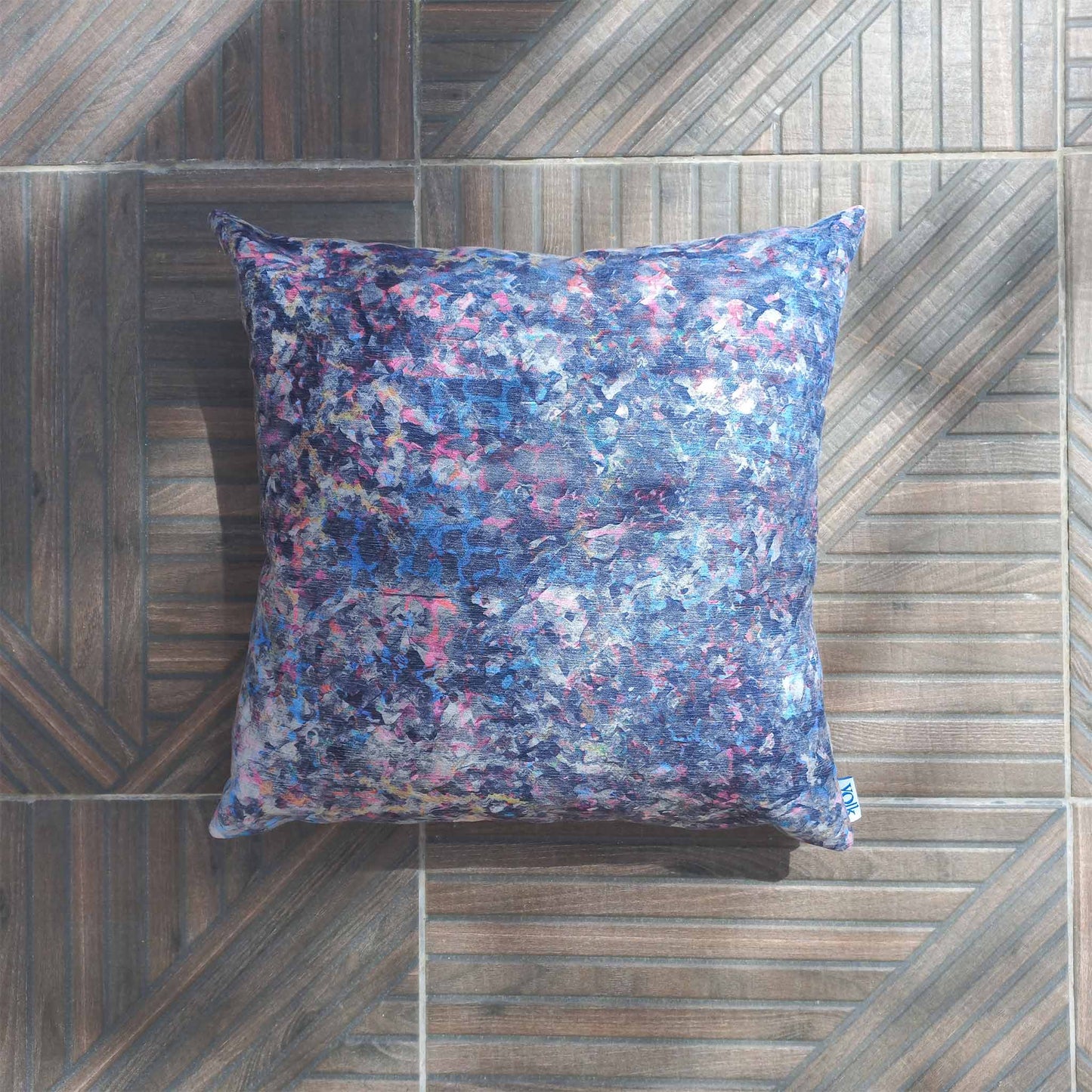Decorative cushion on a patio floor