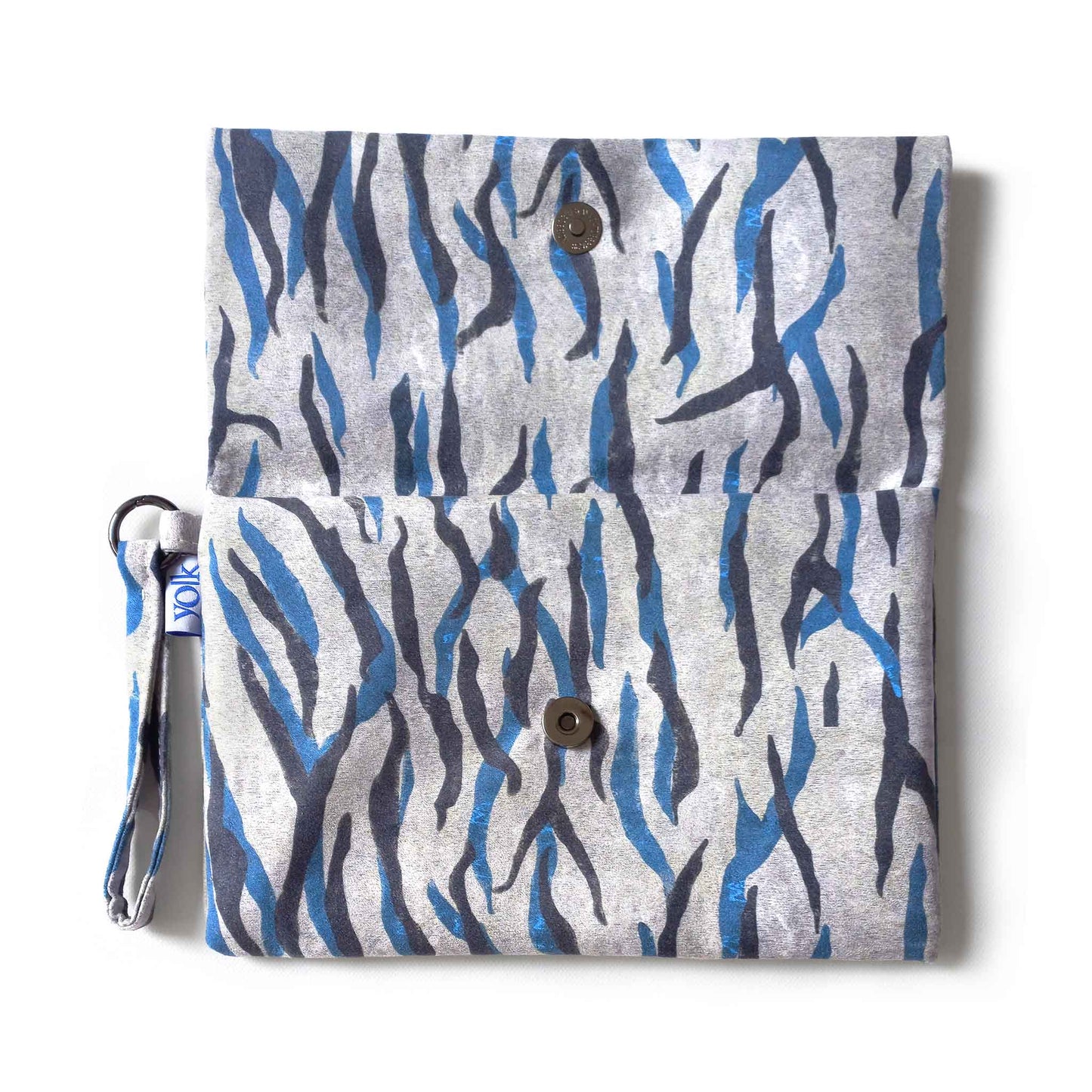 Open clutch bag, button closure detail