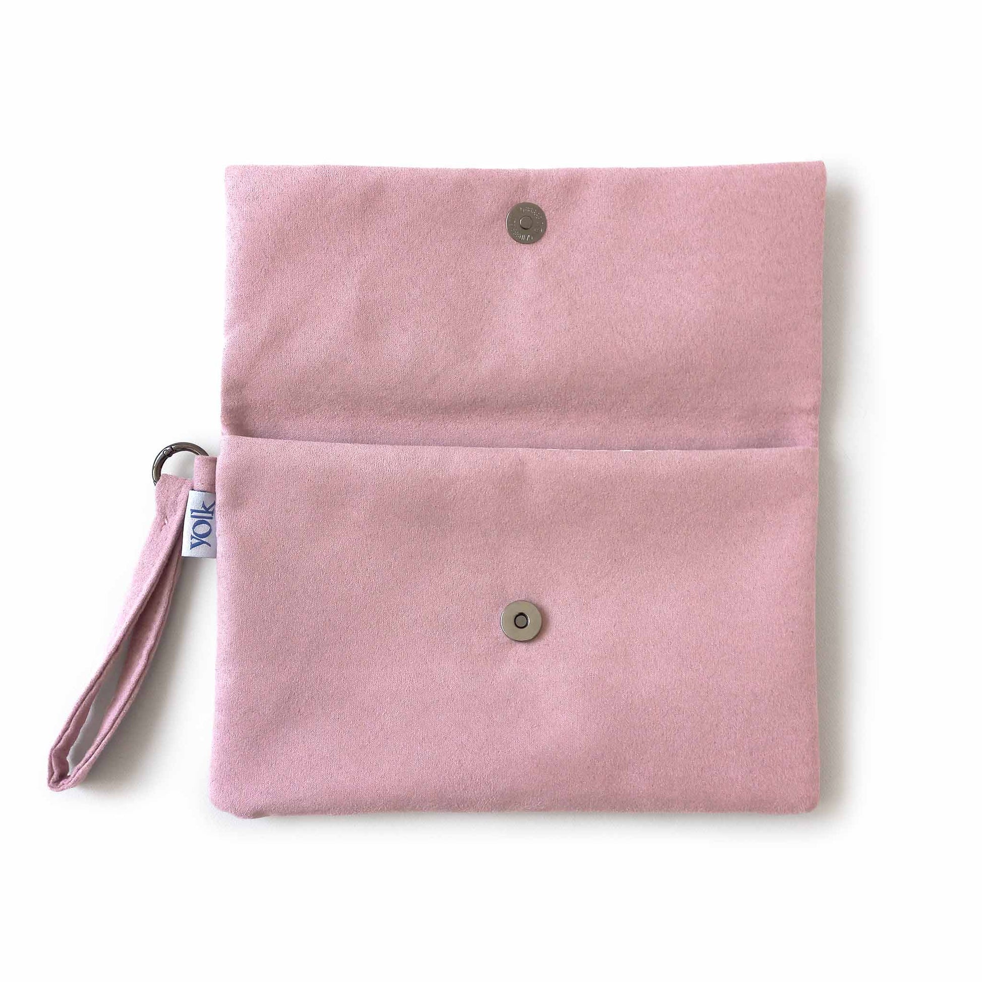 Open pink clutch, button closure detail