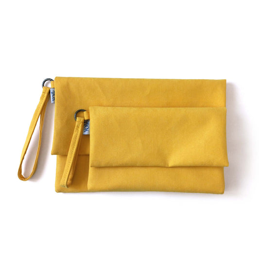 Yellow foldover clutches in two sizes