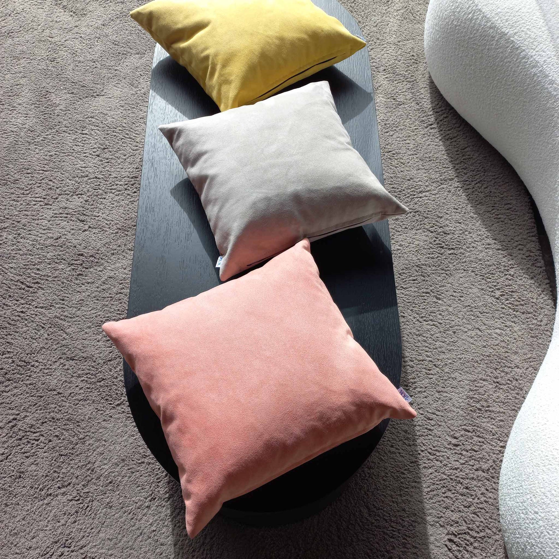 Color cushions laying on a table