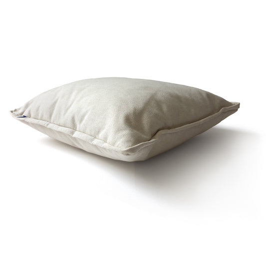 Cream colour decorative cushion, side view