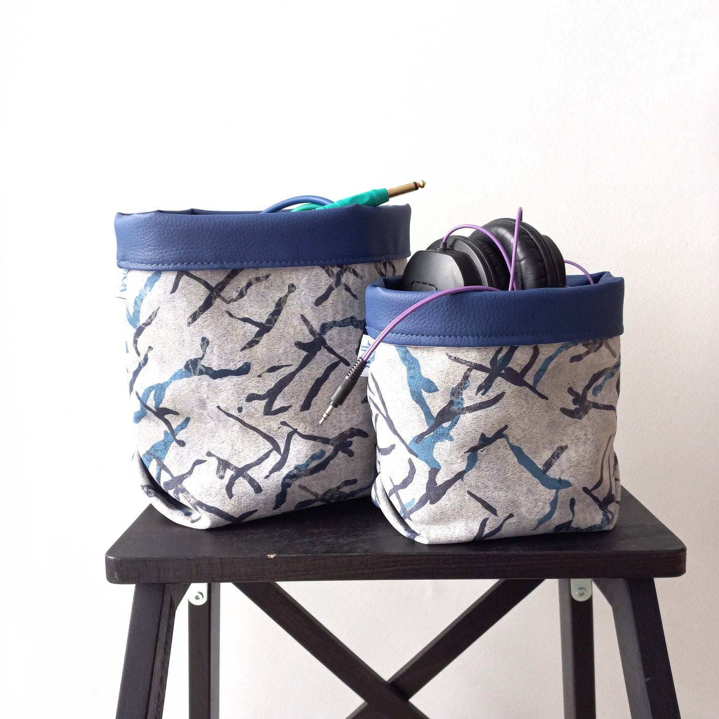 Two printed baskets filled with wires