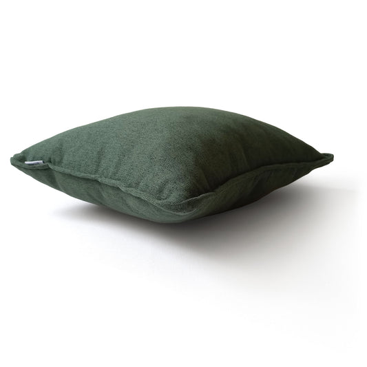 Dark green rectangular decorative cushion, side view