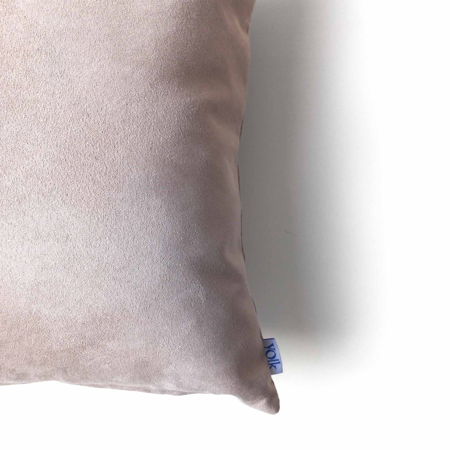 Pale grey decorative cushion detail
