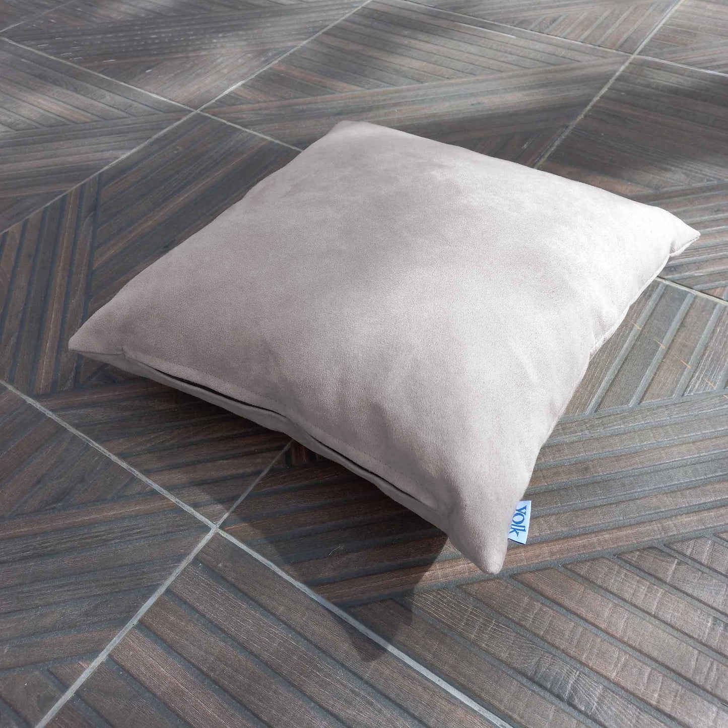 Cushion lying on patio floor