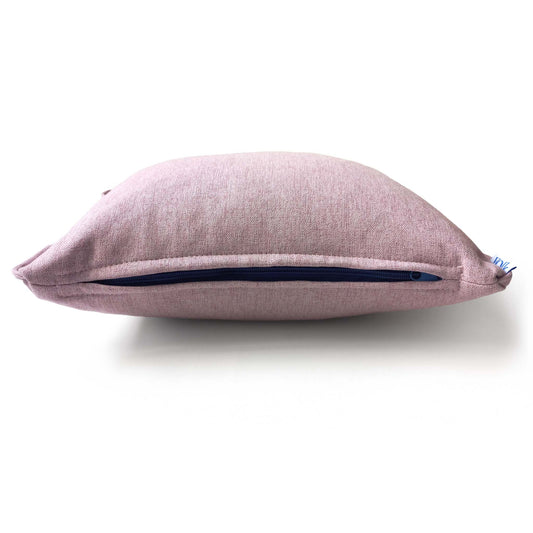 Pink rectangular decorative cushion, side view