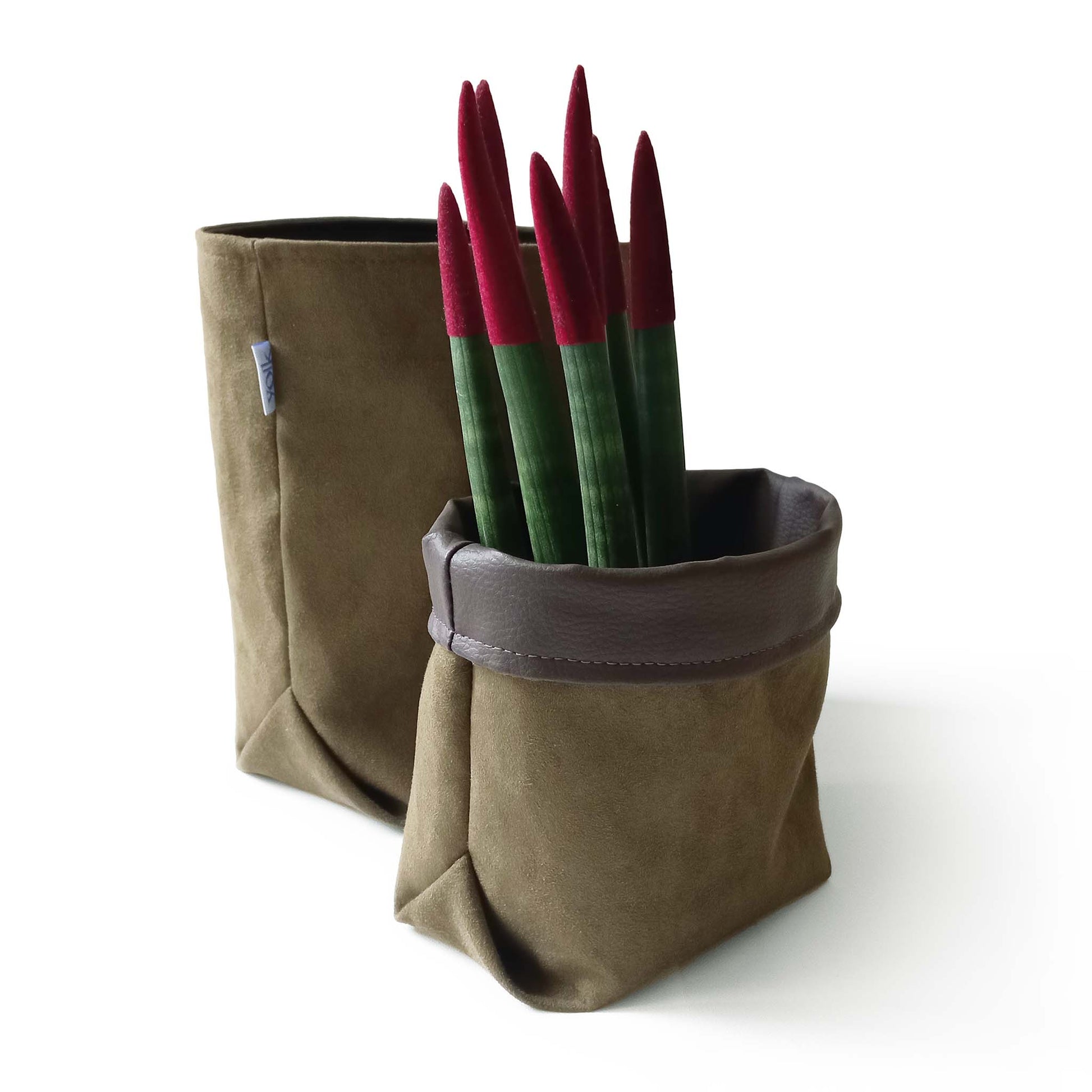 Suede fabric baskets, one used as a plant pot